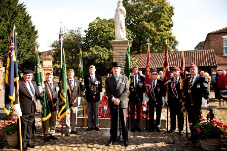 Veterans stood by the statue